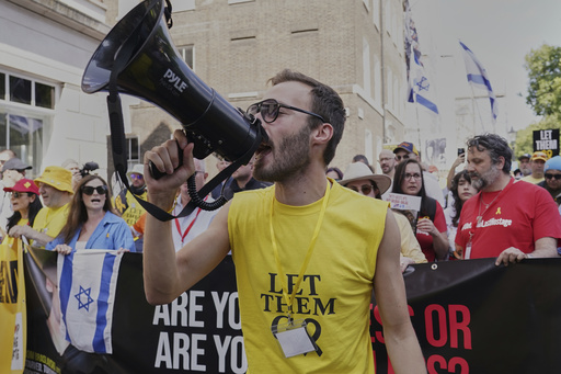 Demonstrators seeking release of Gaza hostages march in London as Middle East tensions grip UK