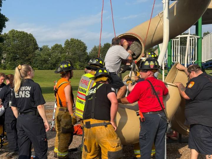 Vernon first responders rescue man stuck in slide