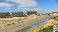 Hurricane Erin buries Outer Banks motel in sand, cuts off main road