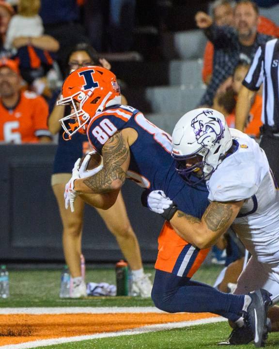 Beatty returns punt for TD, breaks Grange's nearly 102-year-old mark in No. 12 Illini's opening rout