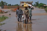 Floods displace nearly 250,000 people in Pakistan as three major rivers overflow