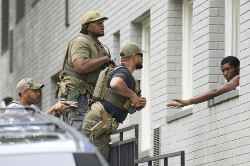 Photos show Trump’s federal crackdown in a DC neighborhood