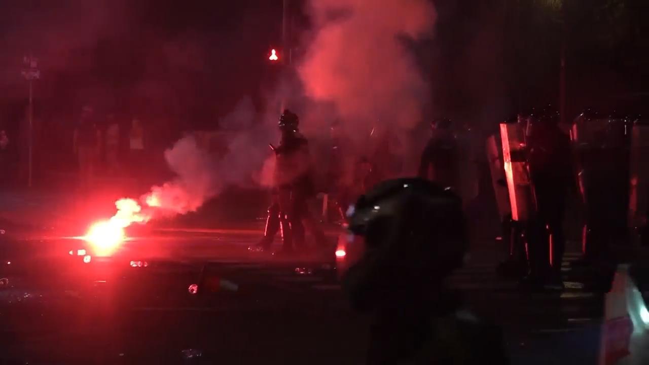 Clashes erupt at protest in Serbia for 3rd day between police, government opponents and supporters