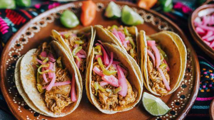 A Sweet Pantry Staple Is Your Ticket To Caramelized Pork Carnitas
