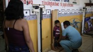 Residents of a remote island disputed by Colombia hope their Peruvian government won’t forget them