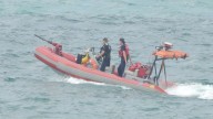 Jet ski riders rescued from high waves in Lake Michigan