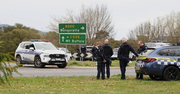 Police in Australia hunt gunman after two officers killed in rural town