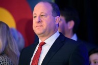 Polis announces $252 million in cuts to close Colorado deficit