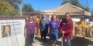 LOVED Organization distributes bags of food to those in need of assistance