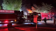 Fire crews rescue two residents from burning home in Hillsboro; one later dies