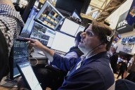 S&P/TSX composite edges slightly lower as markets watch Trump