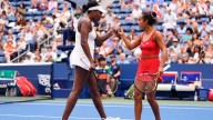 Venus Williams wins a US Open women's doubles match for the 1st time since 2014