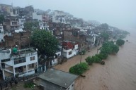 Mass evacuations in eastern Pakistan as India releases water from swollen rivers