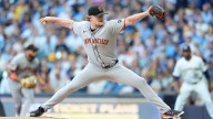 Webb helps Giants stop slide with 7
