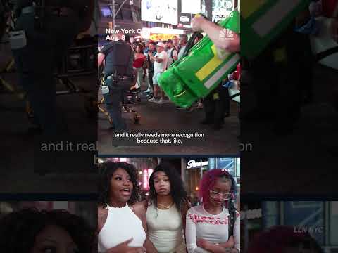 Tourists react after three people injured in Times Square shooting