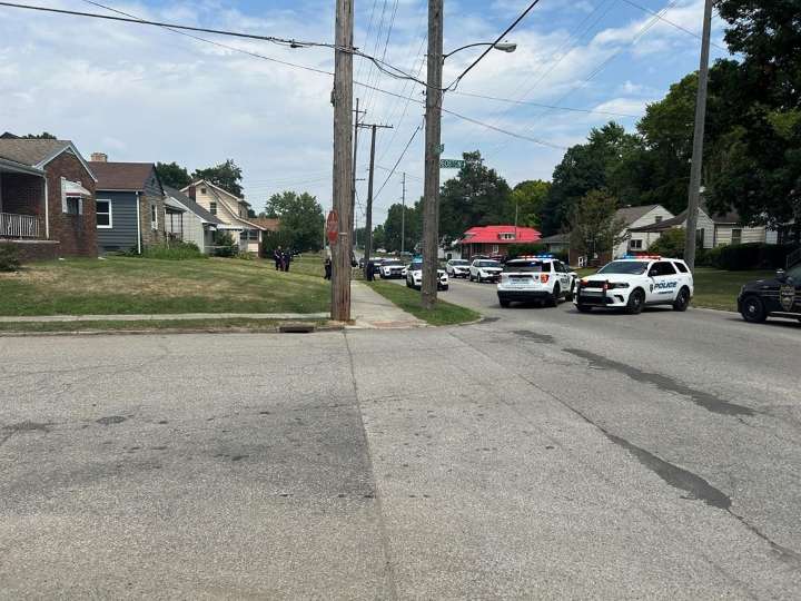 Two charged after shots fired at car with two