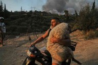 Wildfires blaze across southern Europe