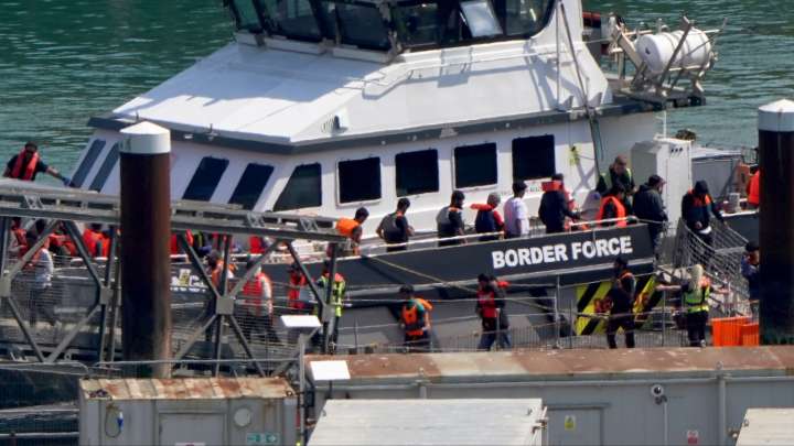 First migrants detained in UK under new UK