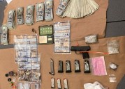 Jeep without plates leads to drugs, guns, cash bust in Portland