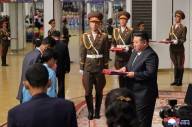 North Korea's Kim inspects new missile production line, KCNA says