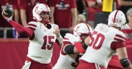 Nebraska holds off Cincinnati with late interception for 20