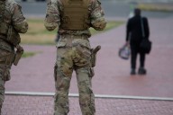 National Guardsmen begin carrying handguns, rifles during deployment in DC