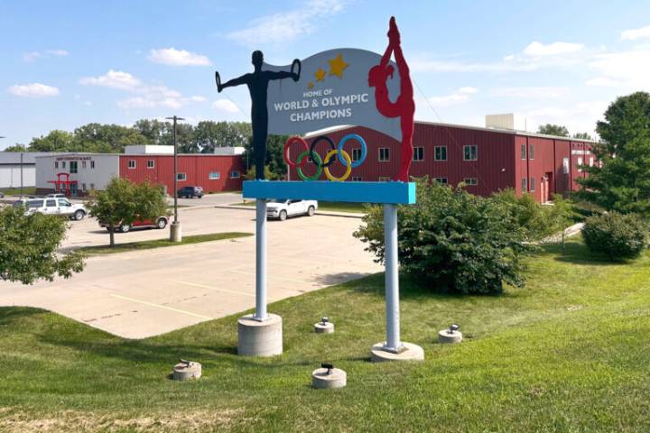 FBI arrests ex-coach of elite gymnastics in Iowa on child porn charge from Mississippi