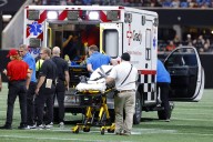 Lions safety Morice Norris leaves in ambulance after injury vs. Falcons