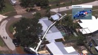 Crane falls on Florida home