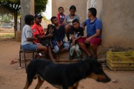 Migrants returning to Venezuela face debt and harsh living conditions
