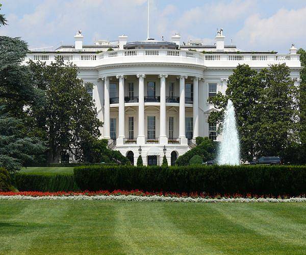 Standing on White House roof, Trump jokes about installing missiles