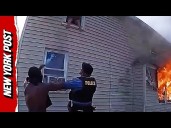 Brave Child Jumps From Second Story Into Officer's Arms to Escape House Fire