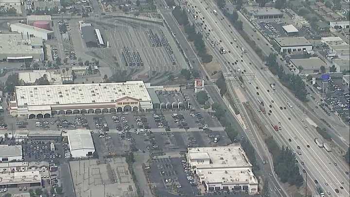 A man running from an immigration raid died after an SUV hit him on a Los Angeles freeway, officials say