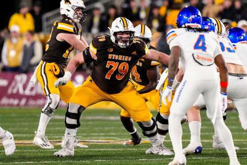A diaper dandy no more, Fremd graduate Walsh still feels at home at Wyoming