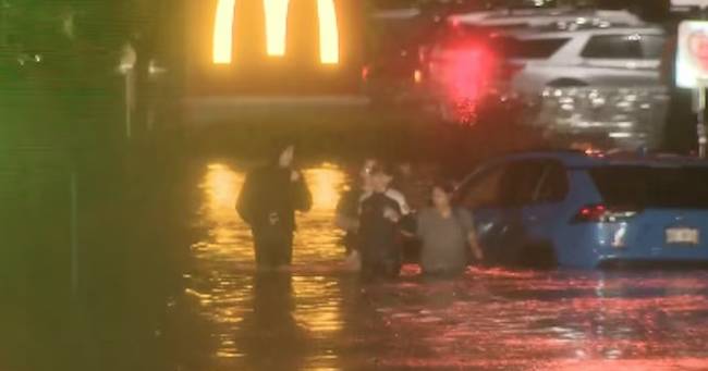 Flash flooding hits the Midwest, as dangerous heat stays put in the West