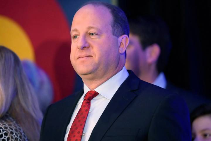 Polis announces $252 million in cuts to close Colorado deficit