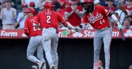 Lux hits 2-run homer, Singer pitches Reds to 4