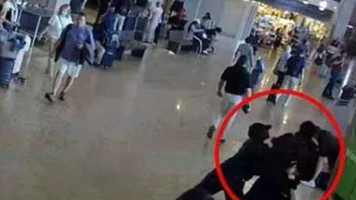 Furious Sha'Carri Richardson strikes boyfriend at Seattle airport in shocking security footage from arrest