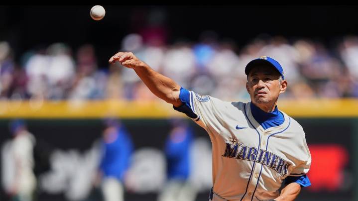 Ichiro Suzuki throws first pitch to Randy Johnson at Mariners game