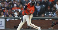 Devers homers early and Giants blank Nationals 5