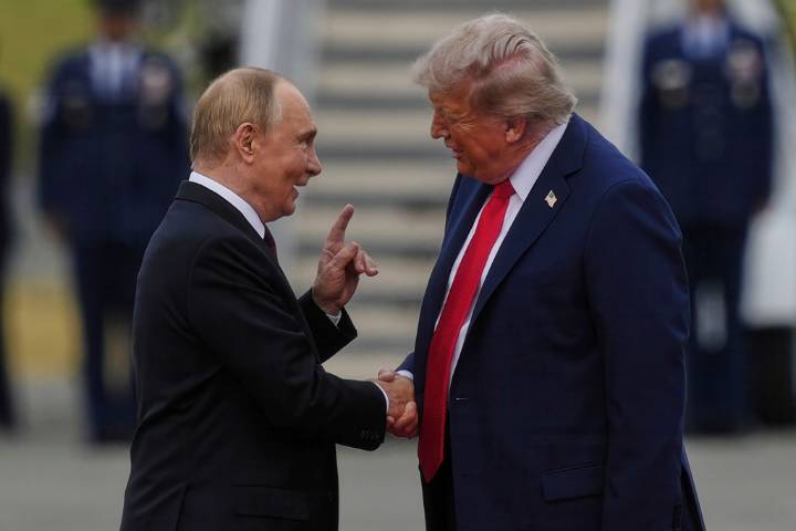 Trump and Putin shake hands warmly in Alaska to kick off their summit on the war in Ukraine