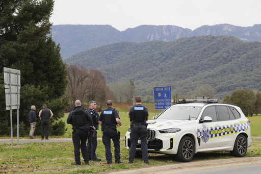 Australian police identify suspect in fatal shooting of officers as manhunt enters second day