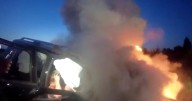 Heroics on the highway as authorities rescue woman from burning car
