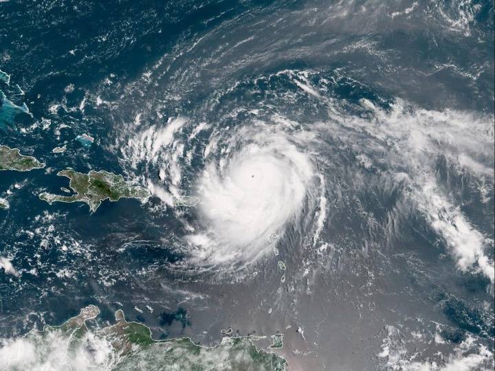 Hurricane Erin downgraded to Category 3, expected to turn northward