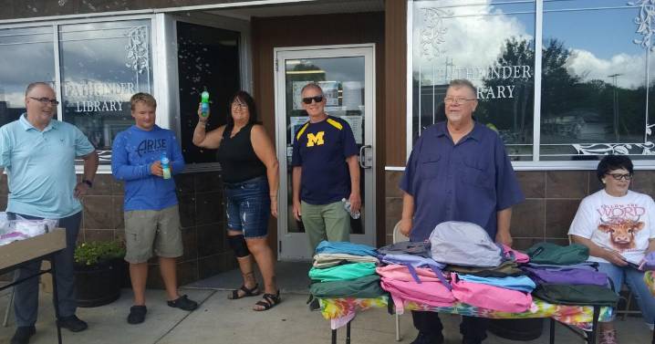 Giving a way backpacks and kindness