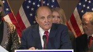 Rudy Giuliani leaves the hospital after being injured in a car crash in New Hampshire