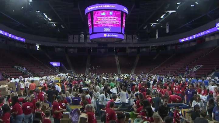Volunteers show out to help Cradles to Crayons prepare students for upcoming school year