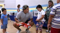 Patriots star Hunter Henry gives out hundreds of sneakers to RI foster kids