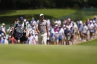 Scheffler turns to fill-in when caddie Ted Scott leaves for family emergency