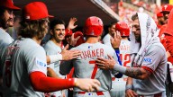 Phillies make quick work of Reds to win fourth straight